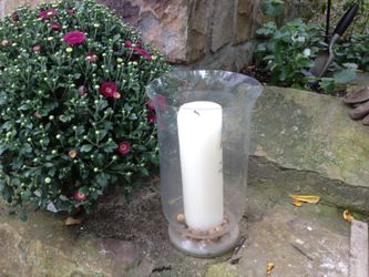 Hurricane glass lantern with with scented candle