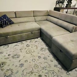 Sectional Sleeper With storage ottoman 