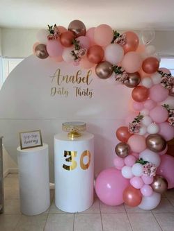 Backdrop, balloon garland and cylinders!!