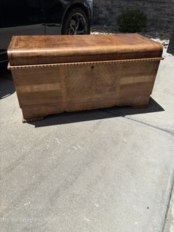Virginia Maid By Lane Cedar Chest. Beautiful item. Hinge opening w/ top tier felt storage. 2 areas as shown with some peeling. Overall great condition