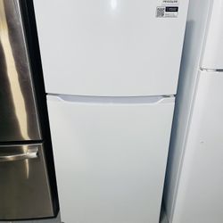 New white Frigidaire refrigerator with a receipt for a 90-day warranty