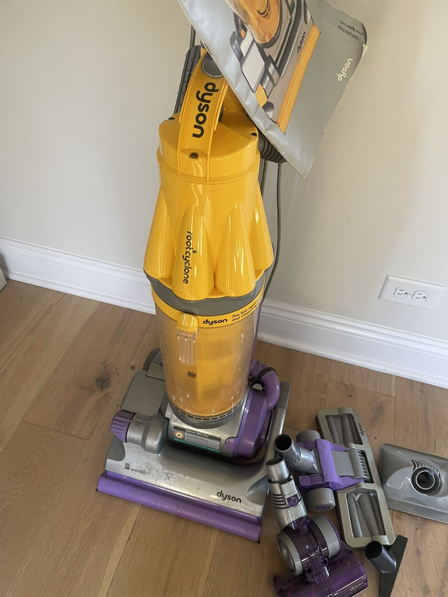 Dyson Vacuum With Atagment And With The Book In Perfect Condition 
