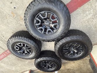 Raptor Rims N Tires.  315/70/R17  95 %