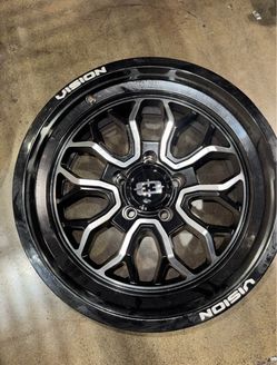 4x 18x8 -12 on a 5x5 Vision Gloss Black Milled Spoke Wheel