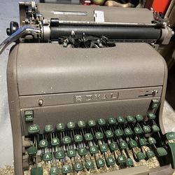 1960!s royal typewriter , gray with green keys