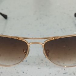 Ray Ban. Gold Frame/Gold Lenses. Good Condition. Aviator Style. Unisex. 