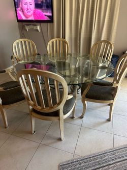 6 Chair heavy dining table and chairs with large round heavy glass