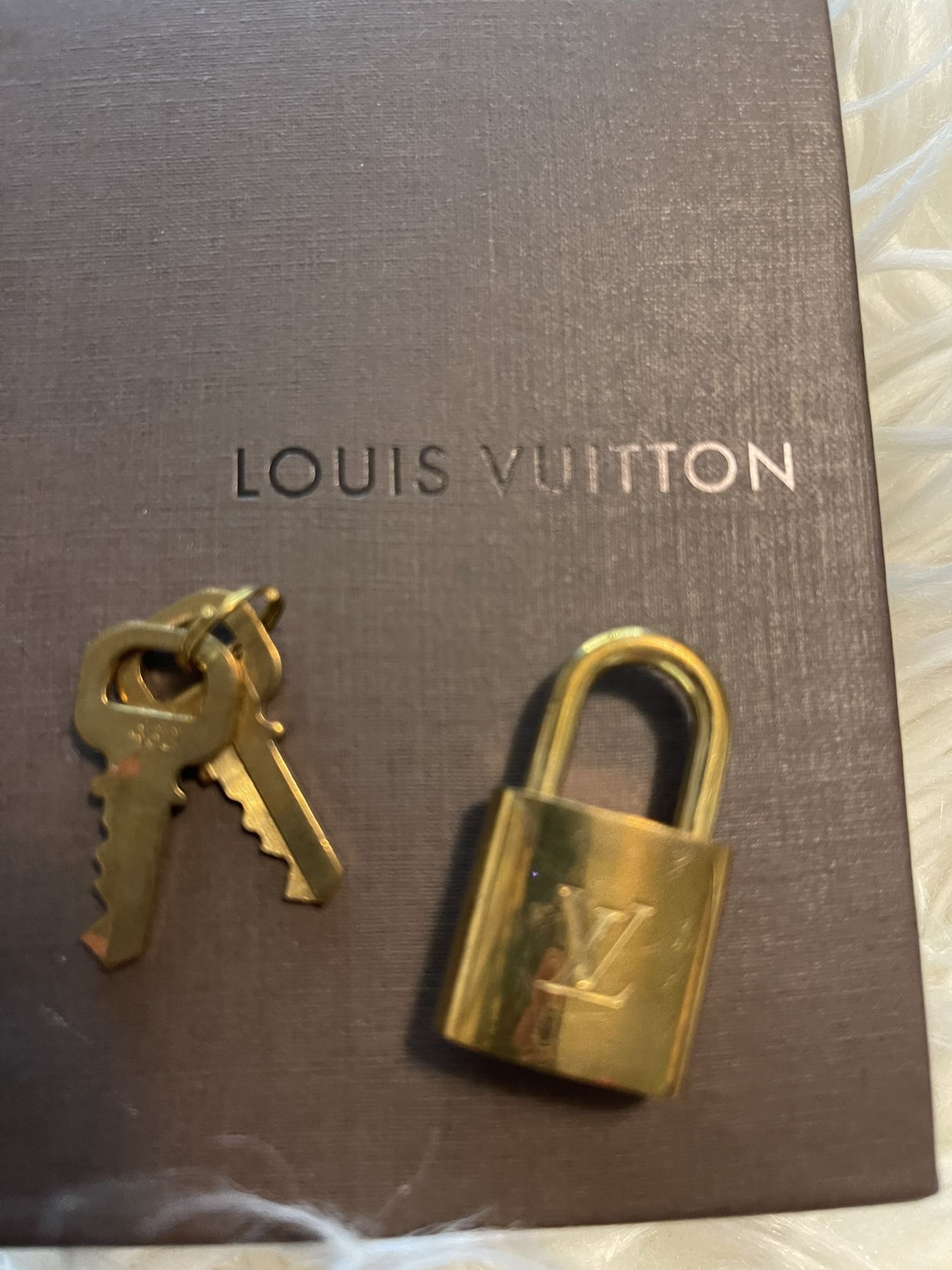 Gold Louis Vuitton Lock & Key Set #309 for Sale in Roma, TX - OfferUp