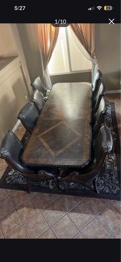 8-person solid oak brown dining table with hair-dismantle it and assemble it back