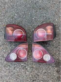 2000 Lexus RX300 OEM Tail Light Set (4-Piece) – Good Condition
