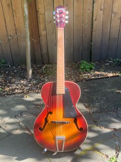 Playtime antique guitar, stand, case, guitar strap and picks