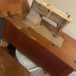 Antique Sewing Machine And Table