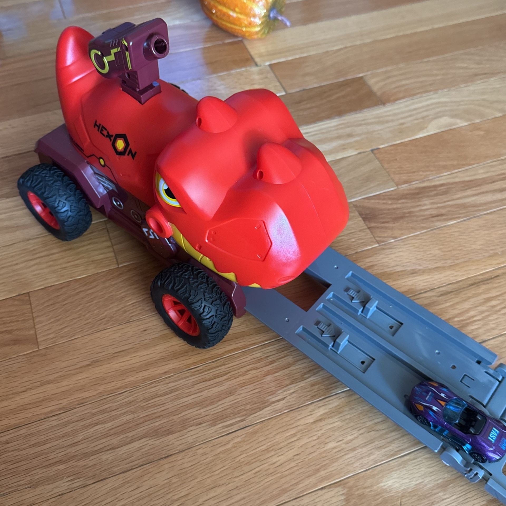 Dinosaur Truck Toy. Used -6$ And New -12$.