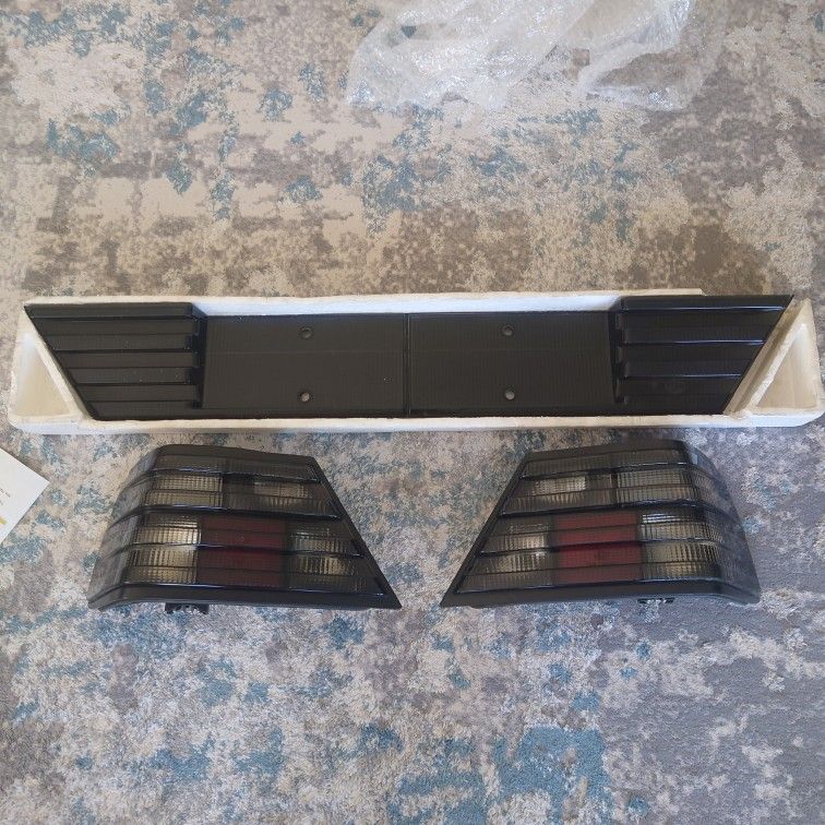 W124 Hella Taillights and Heckblende SMOKED Complete Set. Brand NEW. EXTREMELY RARE!