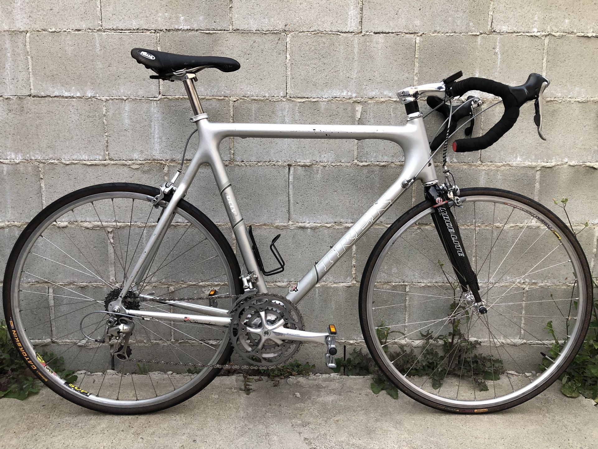 Trek OCLV series 5500 carbon road bike size 58cm. Comes equipped with Ultegra and Dura ace components. Frame is solid with normal wear