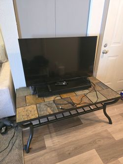 43in 4k TV, Sony Soundbar, and Slate Coffee Table