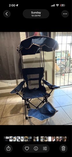 Folding canopy camping chair with footrest