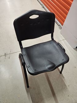 Black plastic chairs