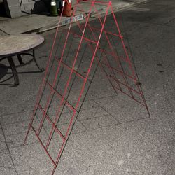 trellis supporting climbing plants or vegetables.  