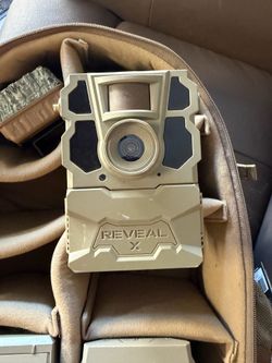 Trail cameras with backpack