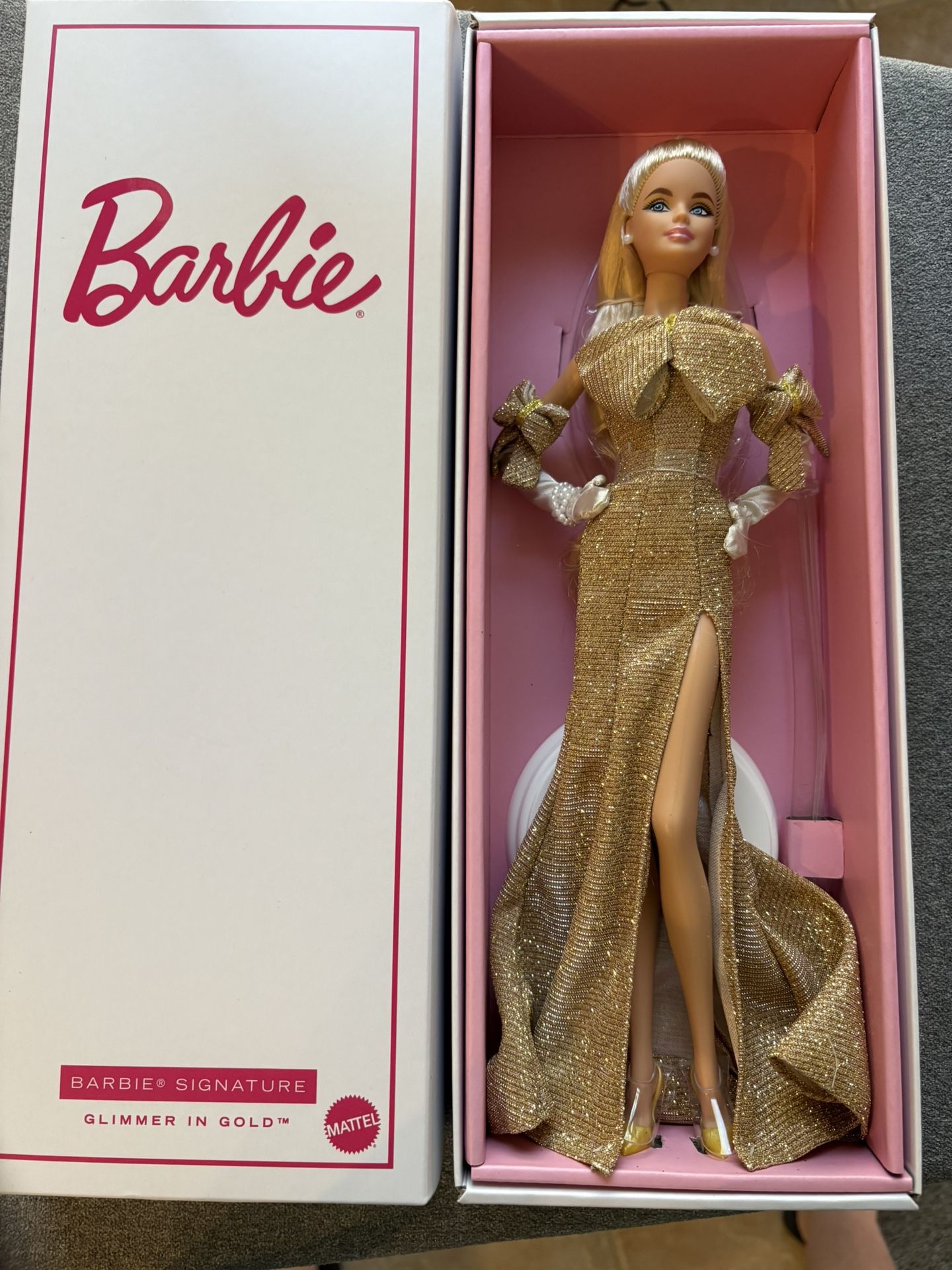 Barbie 2025 national convention doll. Glimmer and gold.