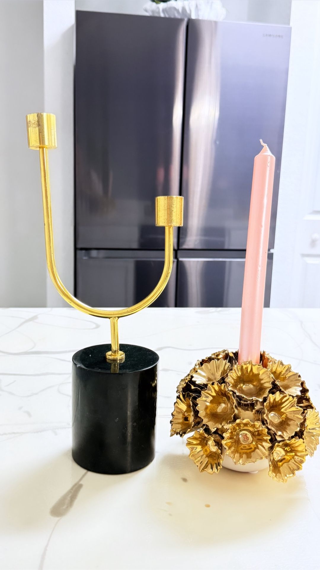Two golden candle holders