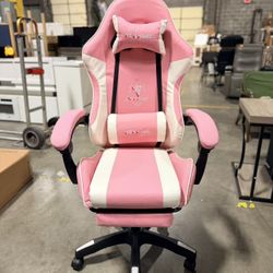 Pink Gaming chair with foot rest, and pillow, 