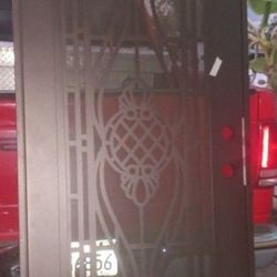 Unique Home Designs Manchester 32 in. x 80 in. Left Hand/Outswing Desert Sand Aluminum Security Door.   with Bronze Perforated Metal Screen