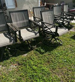 6 Swivel Patio Chairs- Great Condition- NO RIPS