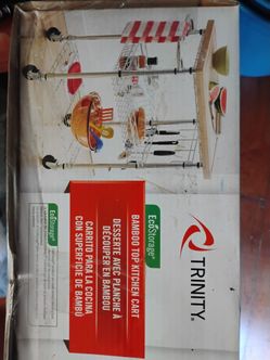 Portable kitchen prep island table with casters.