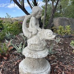 Statue- Child Riding On Fish 