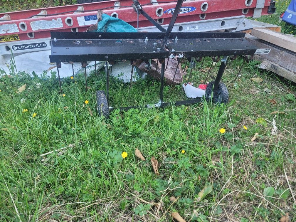 Lawn Mower Thatcher