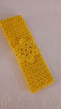Baby girl headband, hand crafted, made with acrylic yarns, new, fits 12months up to a young child, $1.50.