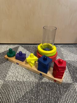 Montessori Stacking rings and melissa and doug stacking counting shapes