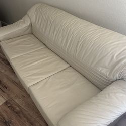Italian leather sofa, bed