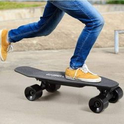 Voyager Tailspin Electric Skateboard
with Remote Control, Speeds up to
9MPH and 5 Mile Range