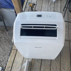 good working portable air conditioner with the window attachment