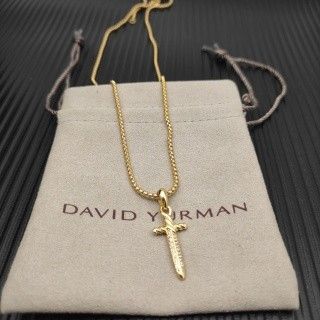 David Yurman gold Petel dagger necklace.