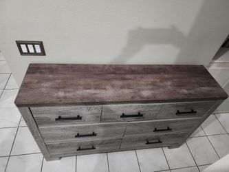 Gray Wood Dresser with Black Handles