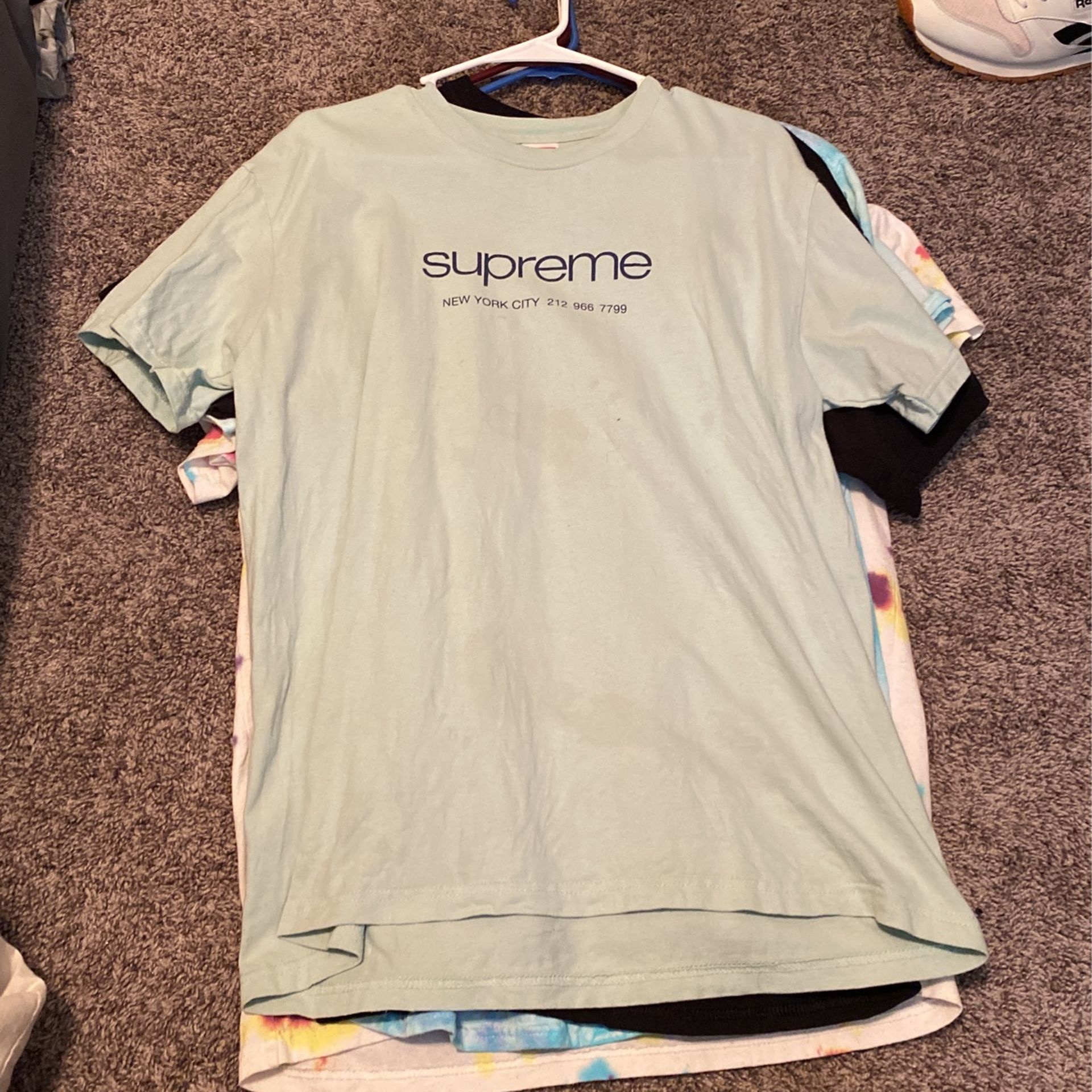 supreme shirts with some stains 