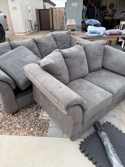 Grey couch and love seat