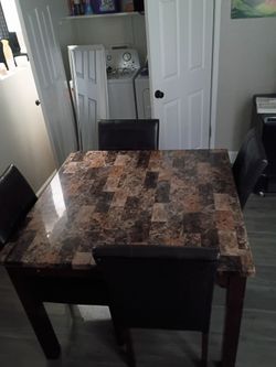 Marble table with all four chairs