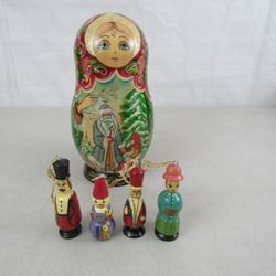 Vintage Russian Christmas Matryoshka Doll with 4 Ornaments Inside


