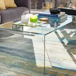All glass sled coffee table