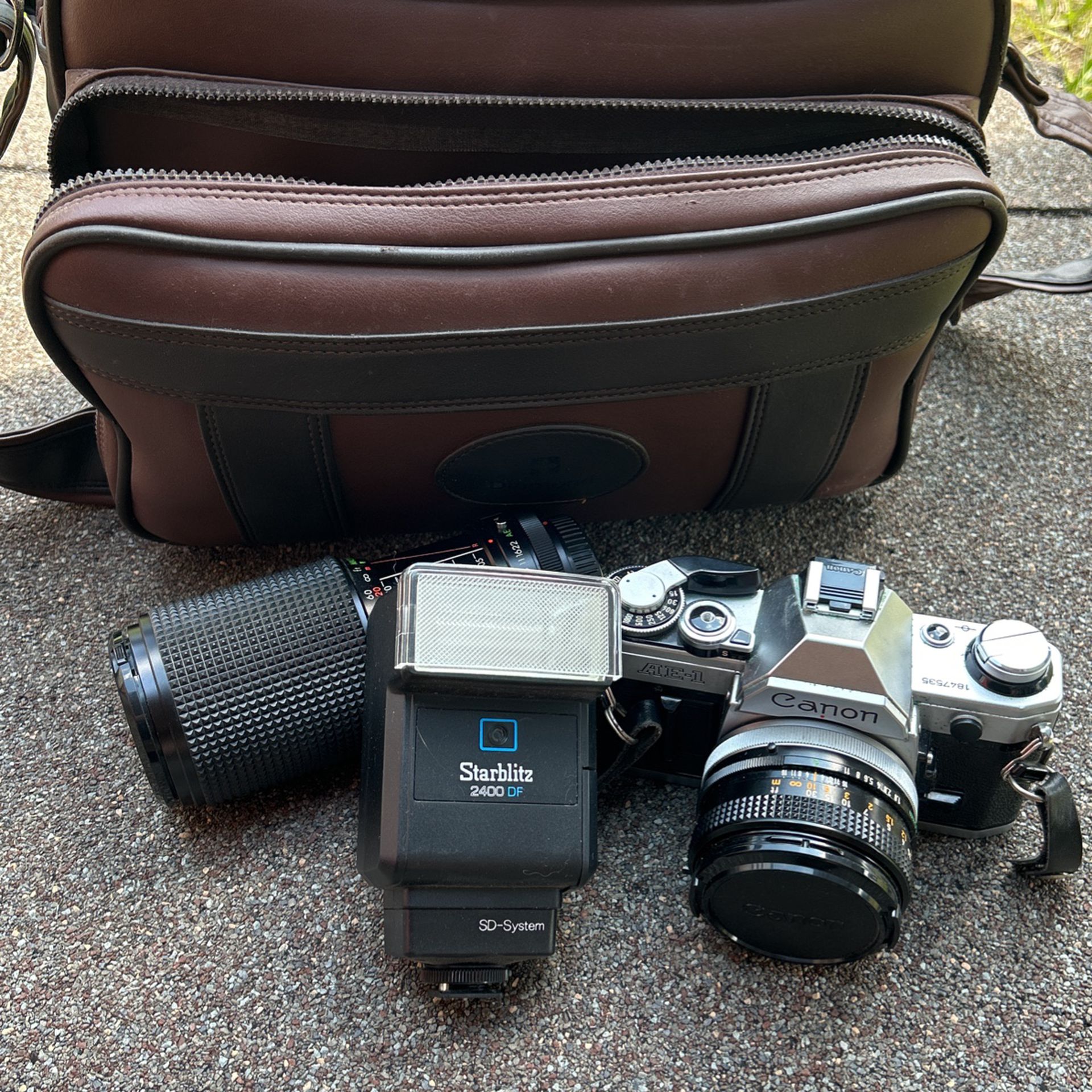 AE-1 Canon Camera And Accessories 