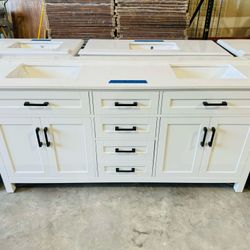Brand new bathroom vanity in White “72" double sink, soft close and solid wood. 6 Drawers, 4 doors with electrical outlets and Marble top in white