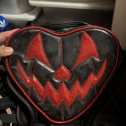 Black/red pumpkin bag by Love, Pain & Stitches