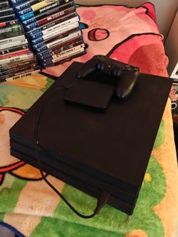 PS4 Pro with Controller, Games, and Hard Drive