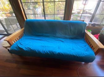 Wooden futon with mattress