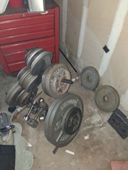 Olimpic wieghts w/bar, wieght stand,bench